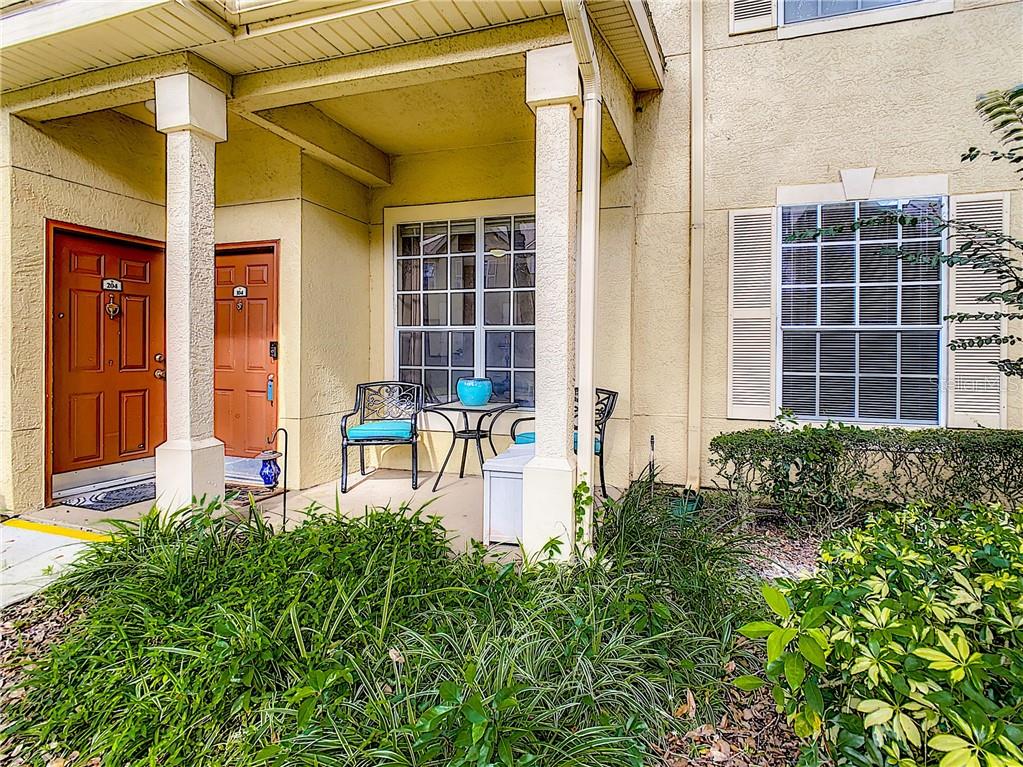 822 Grand Regency Pointe, Unit 104 Altamonte Springs, FL 32714 - Photo 1 of 1 a house view with a outdoor space