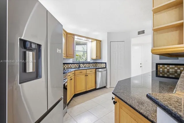 $169,900 | 6855 West Broward Boulevard, Unit 409, Plantation, FL 33317