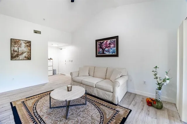 a living room with furniture and a couch