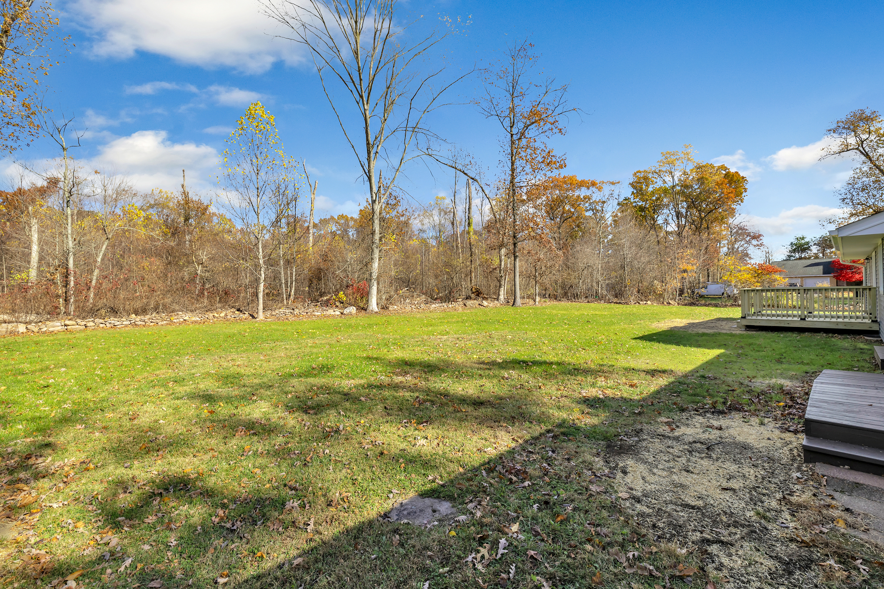 159 Tom Swamp Road Hamden, CT 06518 - Photo 31 of 38 a view of a field with tree in the background