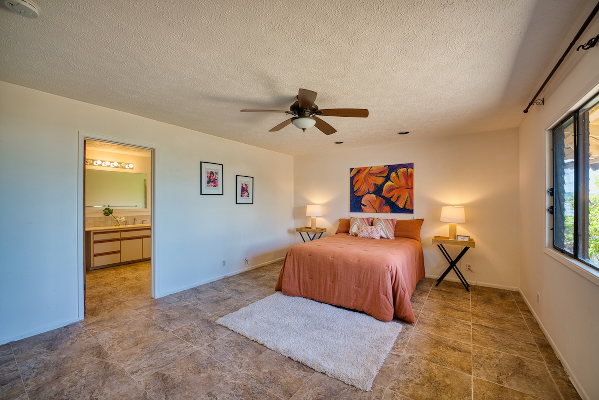 708 Kukuau Street Hilo, HI 96720 - Photo 13 of 18 a bedroom with bed and window