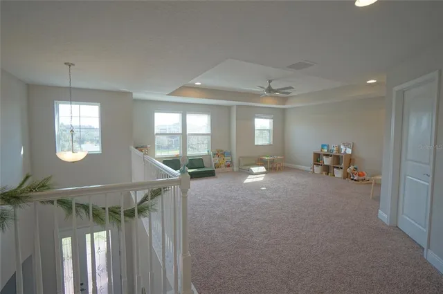 a view of livingroom with furniture and windows