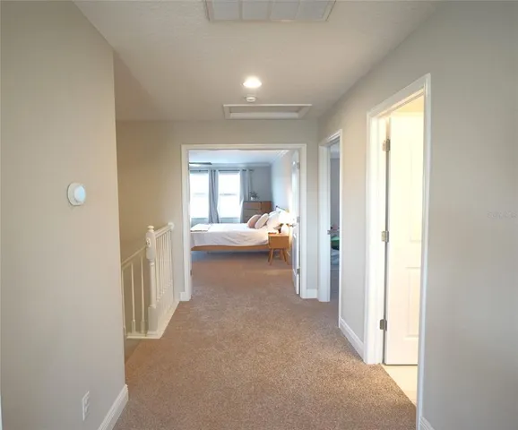 a view of a bedroom from bed room and bedroom