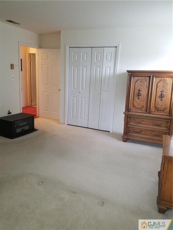 7 Stradford Road Sayreville, NJ 08859 - Photo 23 of 25 a view of an empty room and window