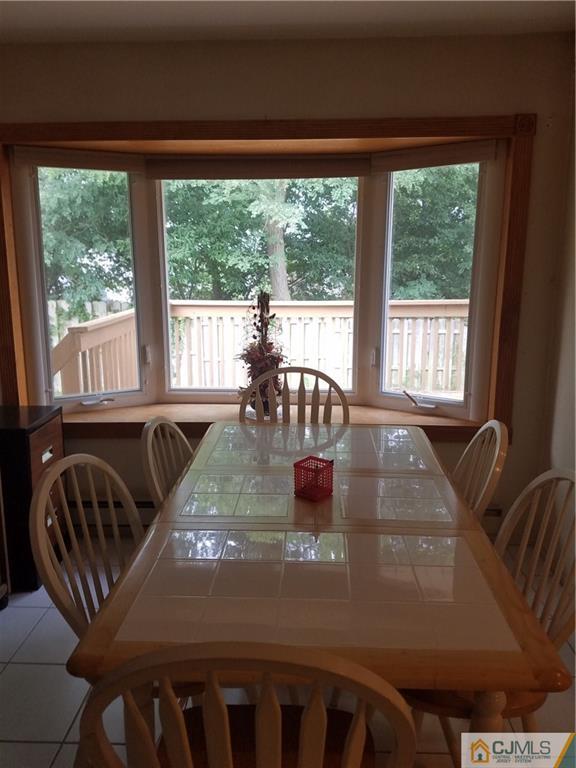 7 Stradford Road Sayreville, NJ 08859 - Photo 9 of 25 a view of a dining room with furniture window and outside view