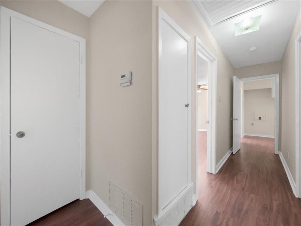 403 Rolando Drive Garland, TX 75040 - Photo 15 of 25 a view of hallway with wooden floor