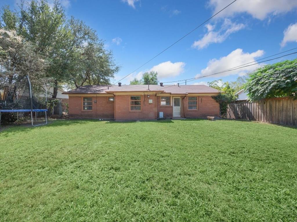 403 Rolando Drive Garland, TX 75040 - Photo 7 of 25 a view of house with a big yard