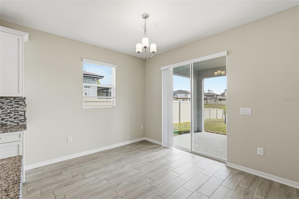 17618 Cortes Creek Boulevard Spring Hill, FL 34610 - Photo 15 of 40 a view of an empty room with glass door