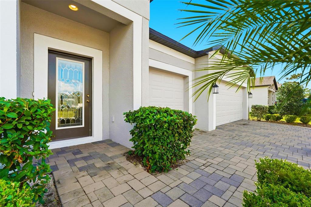 17618 Cortes Creek Boulevard Spring Hill, FL 34610 - Photo 2 of 40 a front view of a house with garden