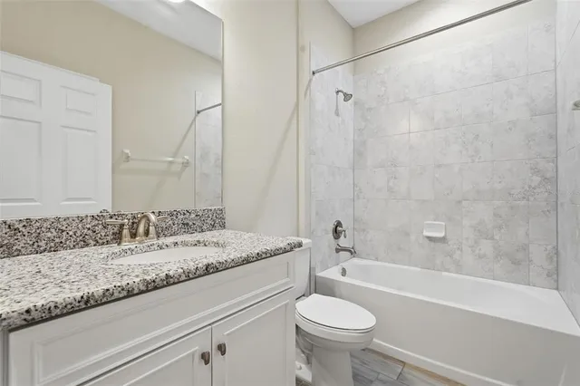 a bathroom with a sink and a bathtub