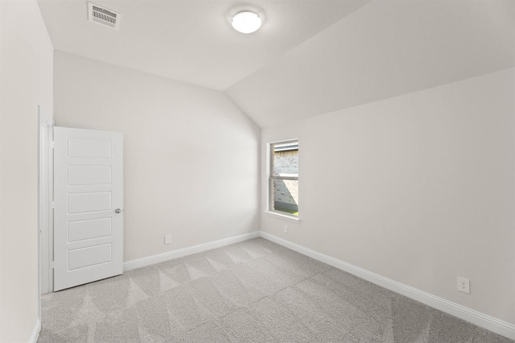 1007 Sedona Trail Justin, TX 76247 - Photo 17 of 40 an empty room with windows