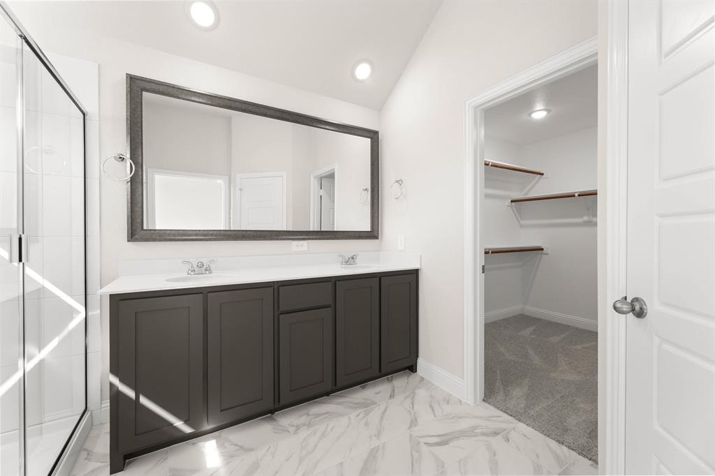 1007 Sedona Trail Justin, TX 76247 - Photo 20 of 40 a bathroom with a double vanity sink mirror and