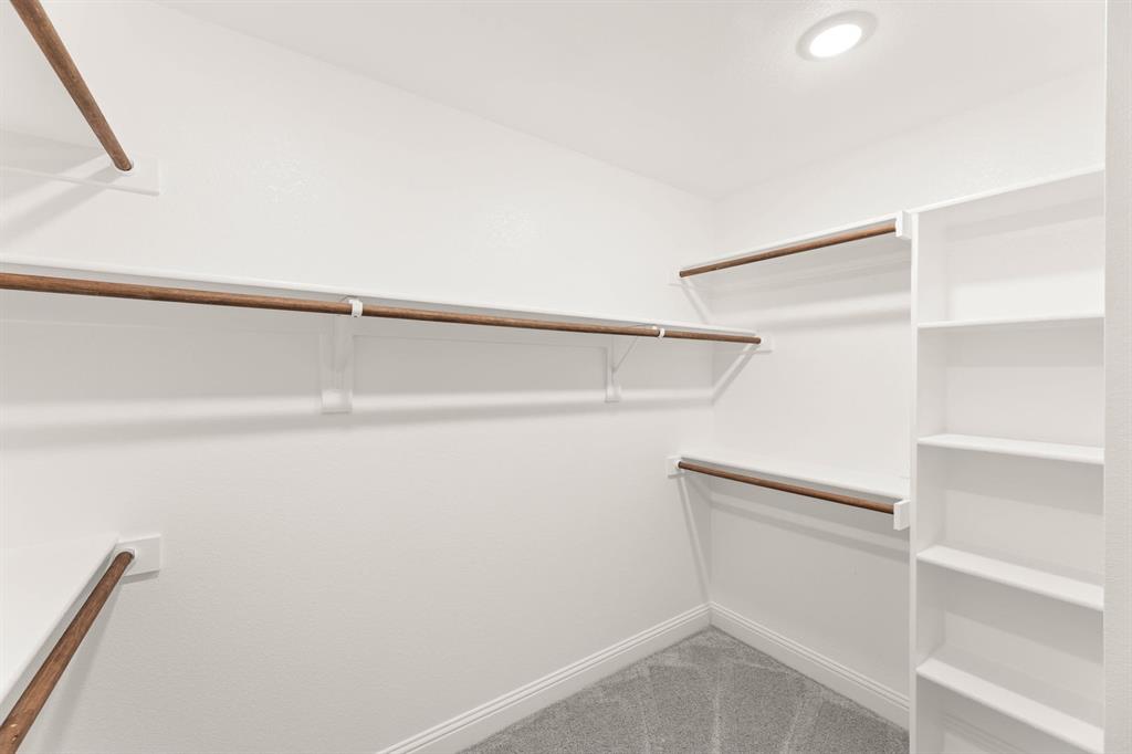 1007 Sedona Trail Justin, TX 76247 - Photo 23 of 40 a view of an empty walk in closet