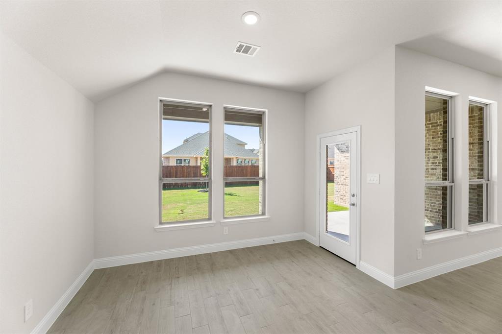 1007 Sedona Trail Justin, TX 76247 - Photo 6 of 40 an empty room with windows