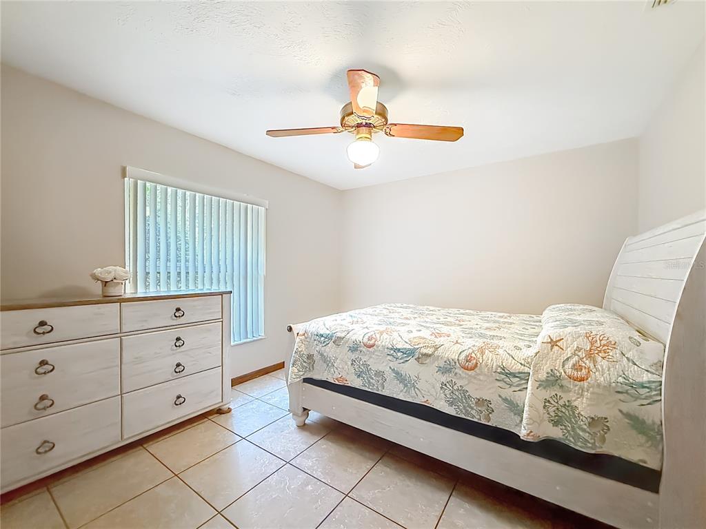 4353 North Indianhead Road Hernando, FL 34442 - Photo 30 of 65 a bedroom with a bed and window