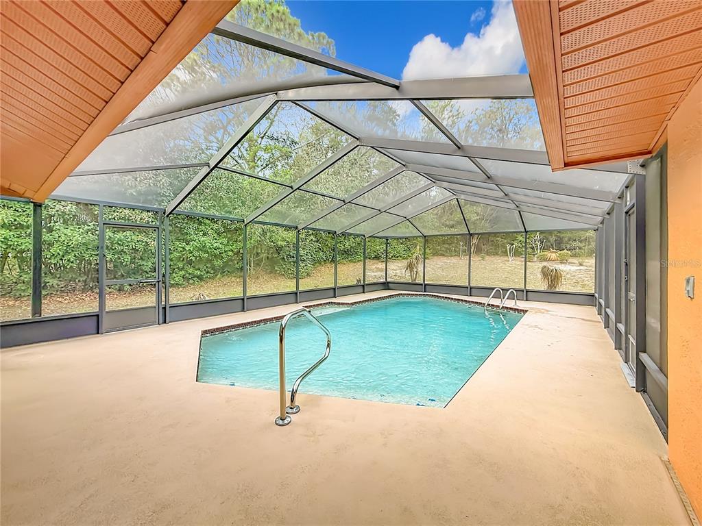 4353 North Indianhead Road Hernando, FL 34442 - Photo 45 of 65 a view of a backyard