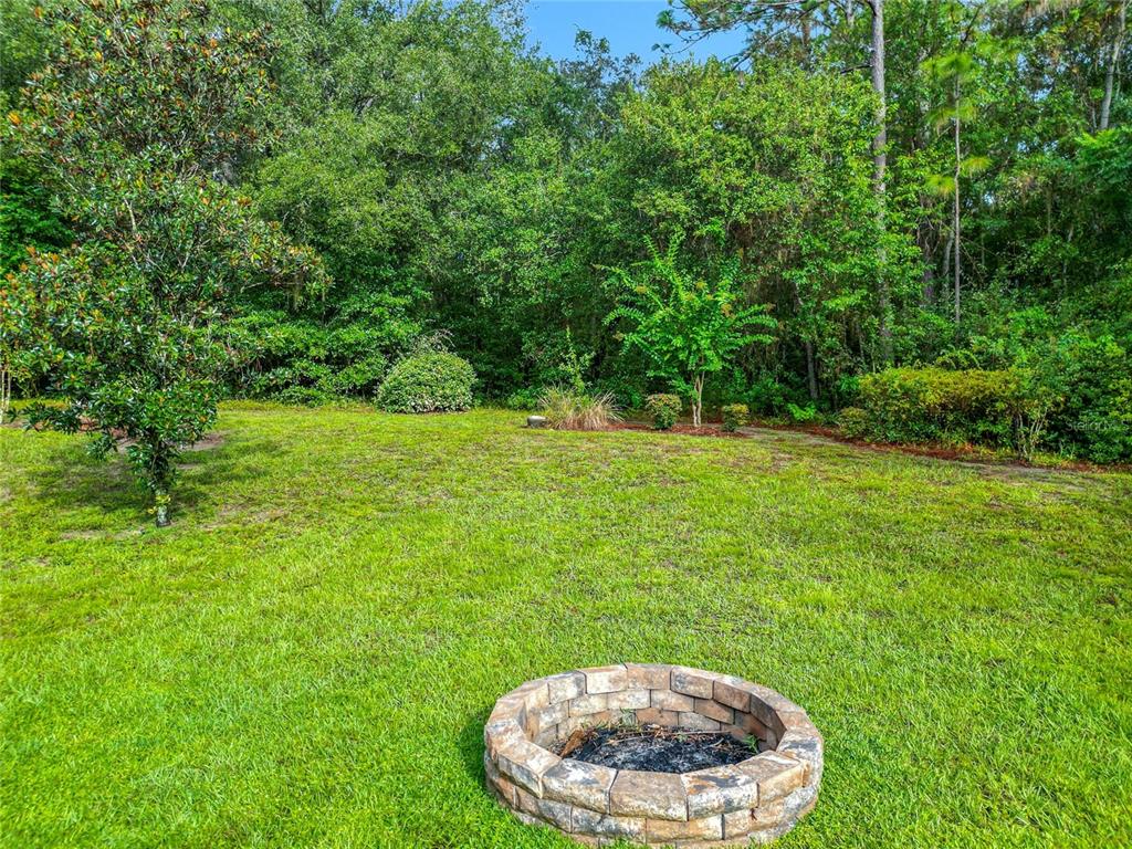 4353 North Indianhead Road Hernando, FL 34442 - Photo 60 of 65 a view of an outdoor space and a yard