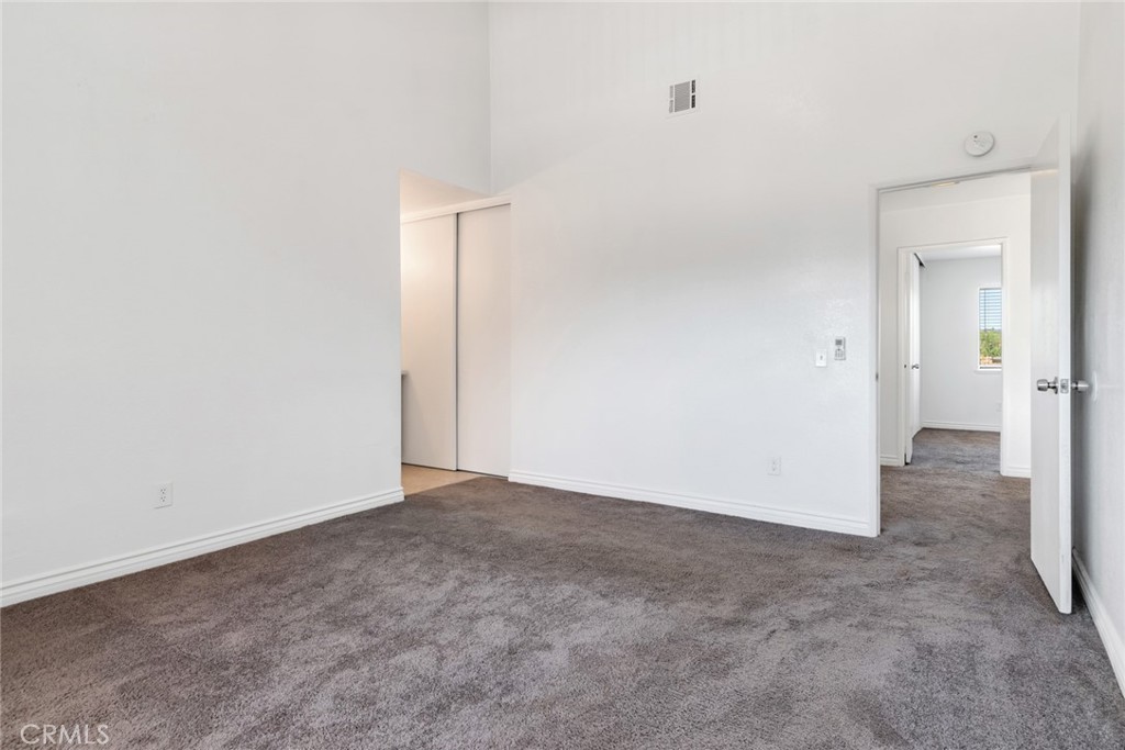 2767 Attenborough Place Riverside, CA 92503 - Photo 16 of 39 an empty room with an entryway