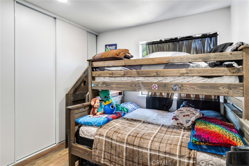 2767 Attenborough Place Riverside, CA 92503 - Photo 26 of 39 a bedroom with bed and a baby crib