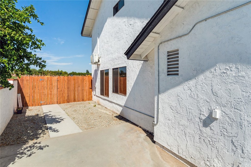 2767 Attenborough Place Riverside, CA 92503 - Photo 30 of 39 a view of a backyard with a small cabin