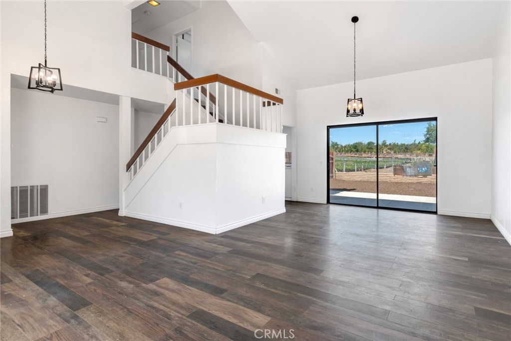 2767 Attenborough Place Riverside, CA 92503 - Photo 5 of 39 a view of empty room with wooden floor and fan