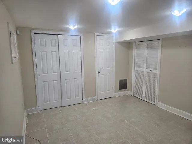 a bathroom with a shower and a bathtub