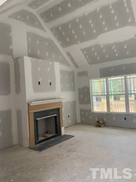 1321 Cobb Road Angier, NC 27501 - Photo 3 of 14 a view of empty room with a fireplace