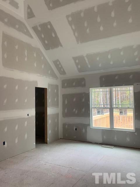 1321 Cobb Road Angier, NC 27501 - Photo 8 of 14 a view of an empty room with a window