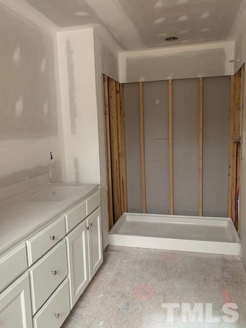 1321 Cobb Road Angier, NC 27501 - Photo 9 of 14 a bathroom with a shower and a sink