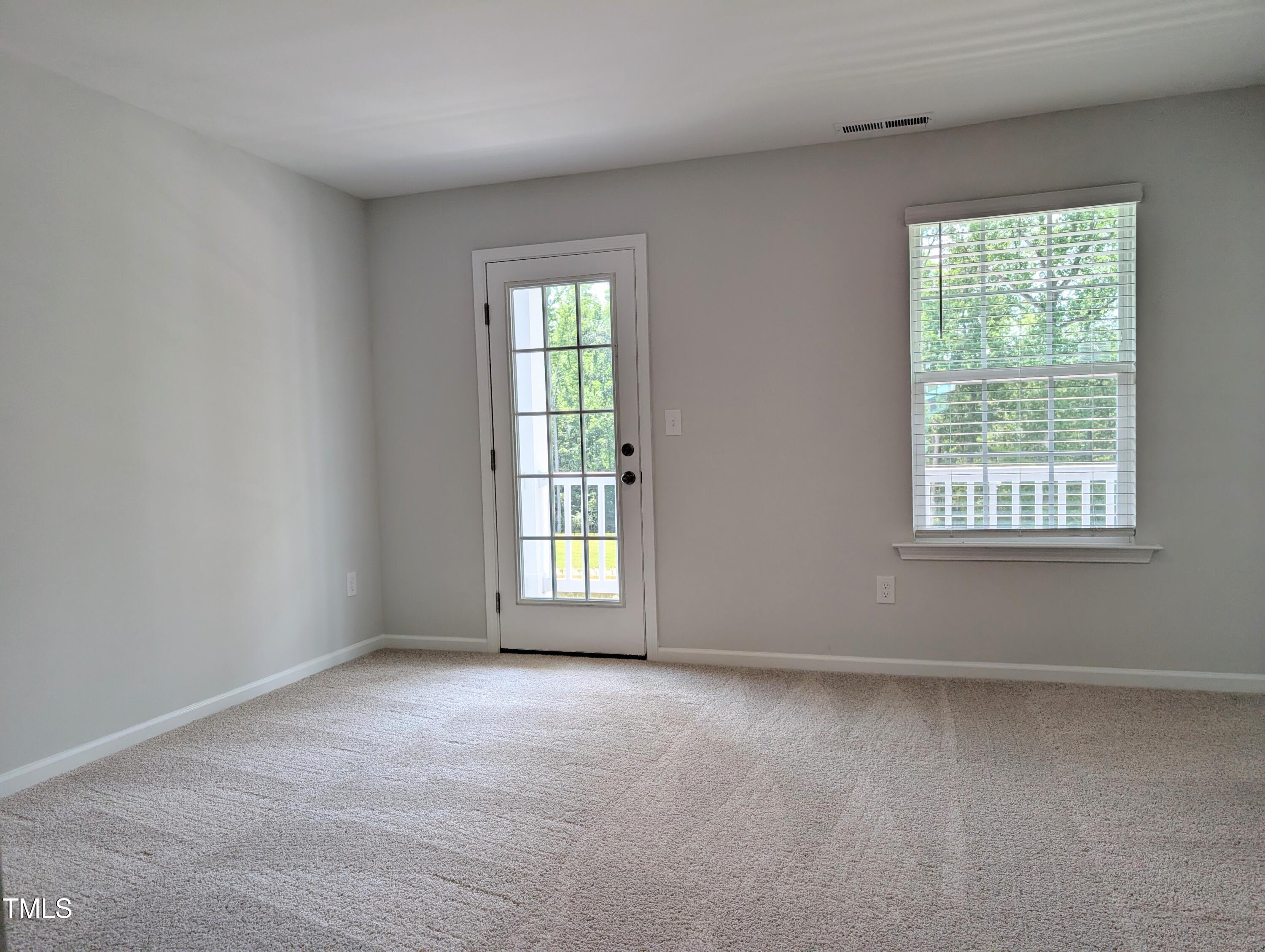 9224 Leaning Post Road, Unit 445 Wake Forest, NC 27587 - Photo 16 of 28 Primary Bedroom to Balcony
