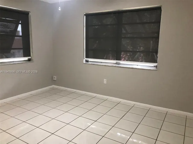 a view of an empty room with window