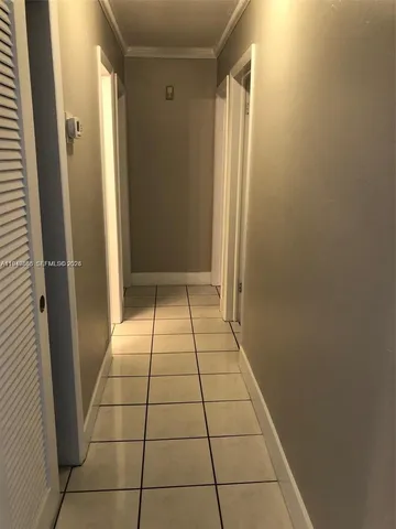 a view of a utility room with windows