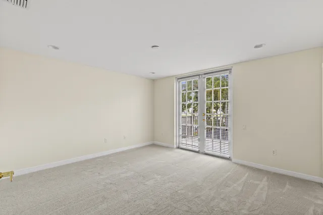 a view of a house with a door and a window