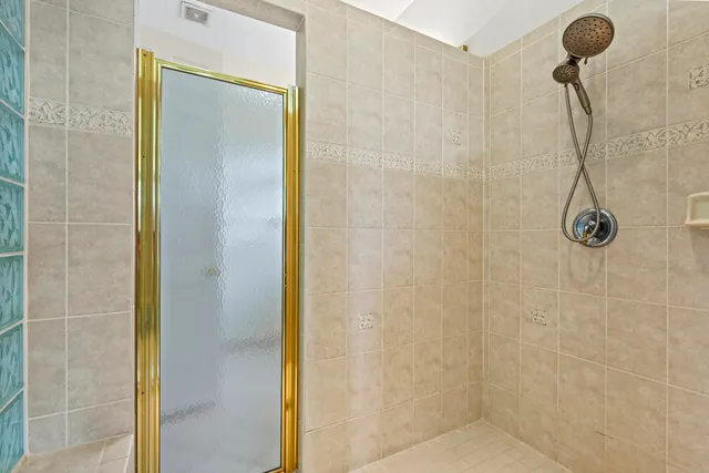 a view of swimming pool with outdoor seating and deck in the back