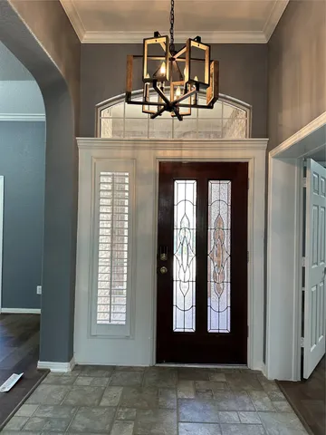 a bathroom with a toilet a sink a mirror a bathtub and shower