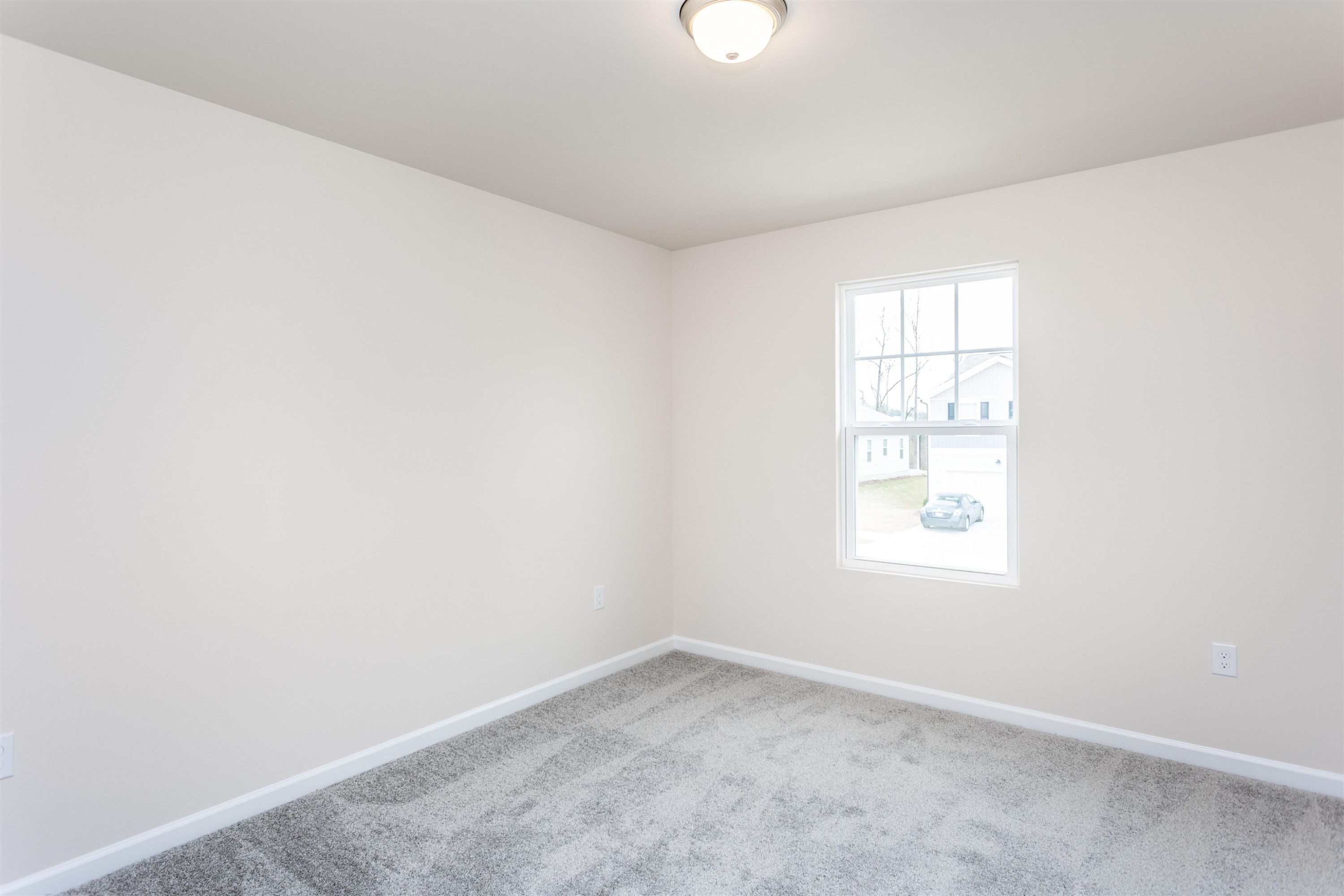 1716 Arapahoe Ridge Drive Raleigh, NC 27604 - Photo 19 of 21 an empty room with a window