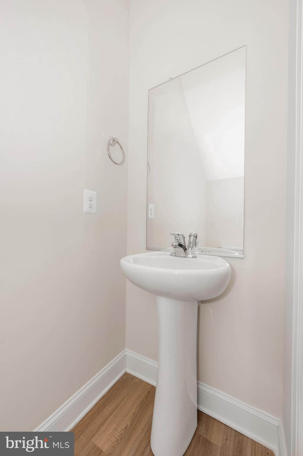9962 Roulette Drive Hagerstown, MD 21740 - Photo 17 of 43 a bathroom with a sink a mirror and shower