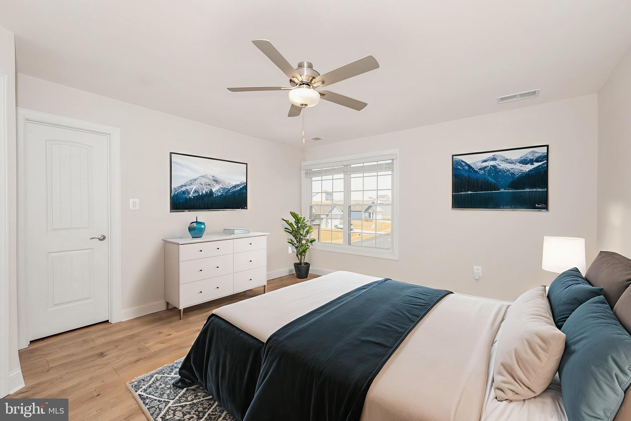 9962 Roulette Drive Hagerstown, MD 21740 - Photo 20 of 43 a bedroom with a bed and a flat screen tv