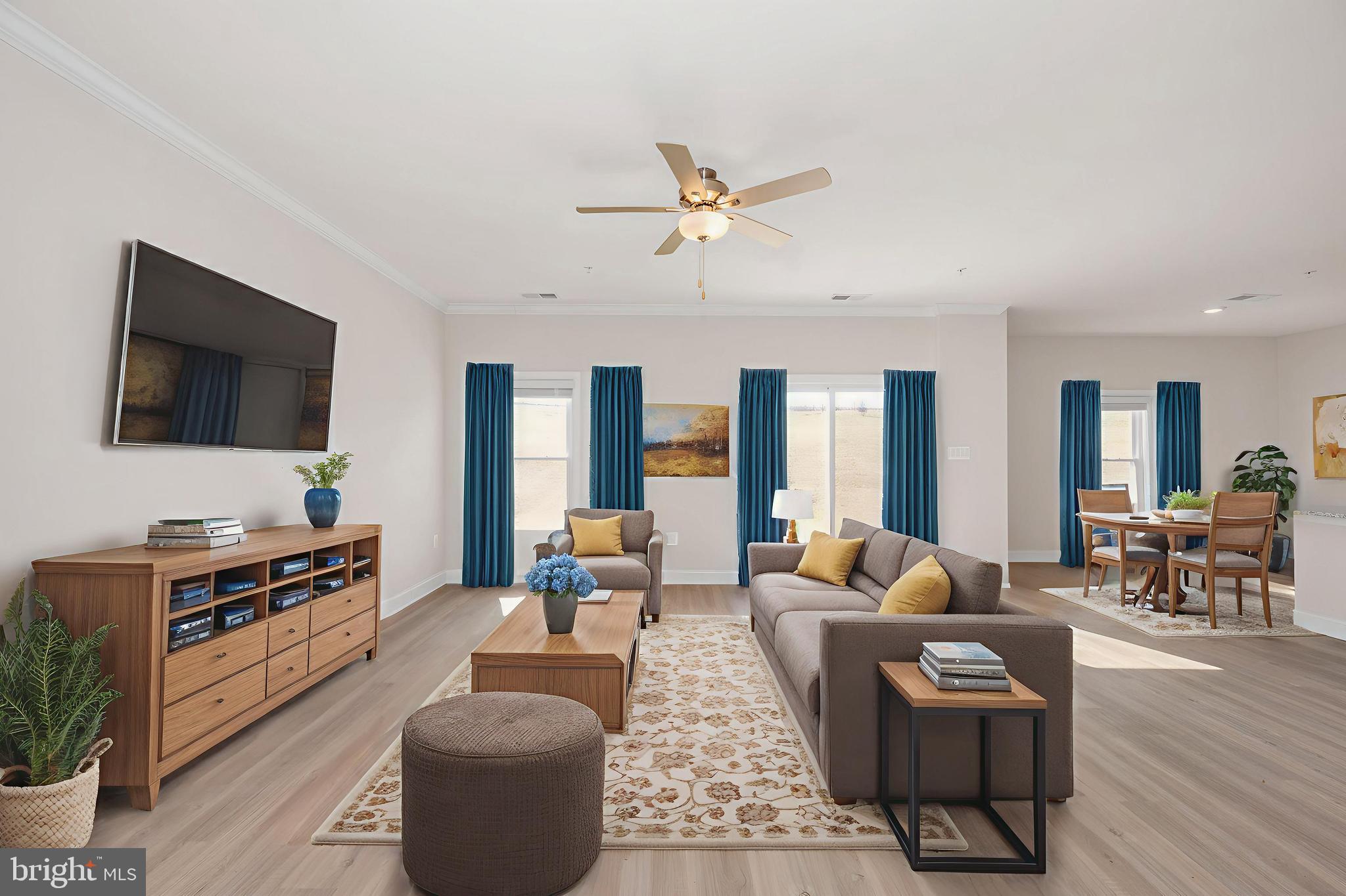 9962 Roulette Drive Hagerstown, MD 21740 - Photo 2 of 43 a living room with furniture and a flat screen tv