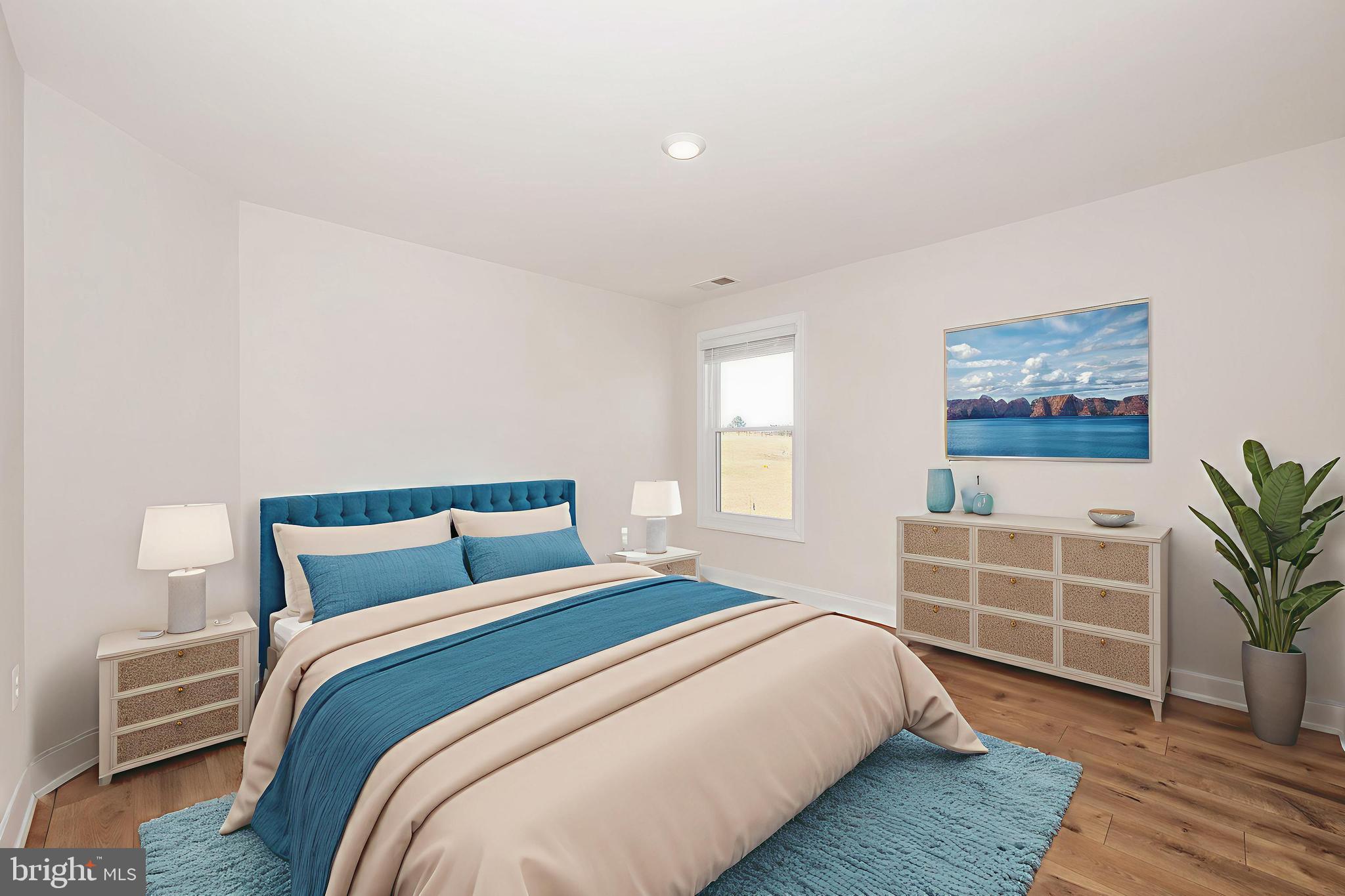 9962 Roulette Drive Hagerstown, MD 21740 - Photo 29 of 43 a bedroom with a bed and a window