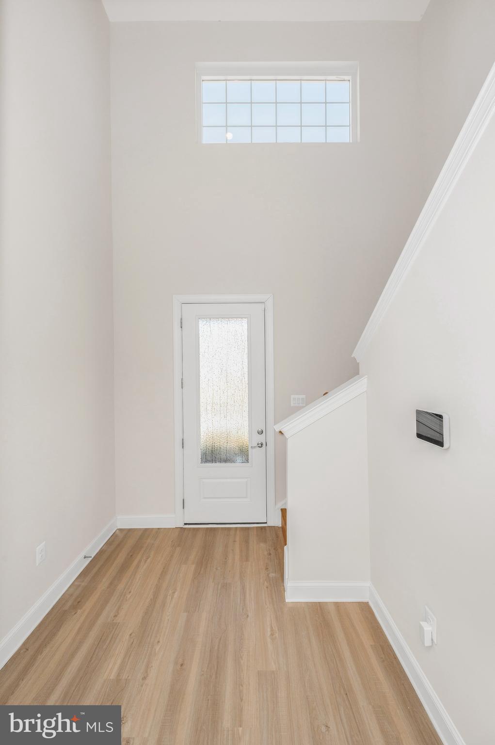 9962 Roulette Drive Hagerstown, MD 21740 - Photo 6 of 43 a view of empty room with wooden floor