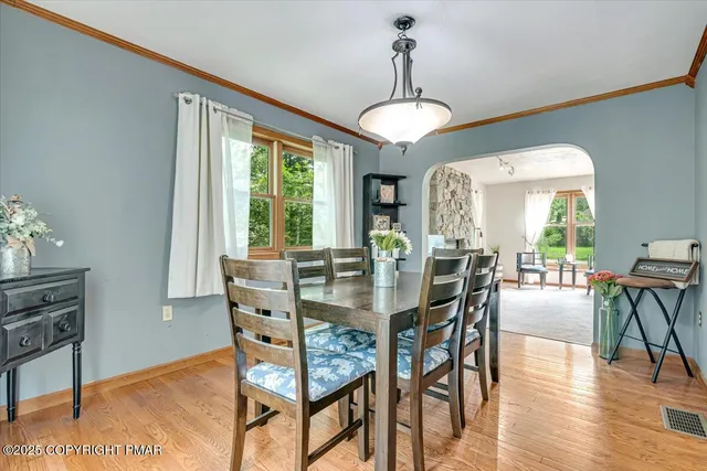 a kitchen with stainless steel appliances granite countertop a stove sink and cabinets
