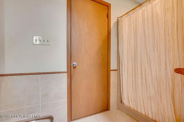a view of a house with a yard porch and sitting area