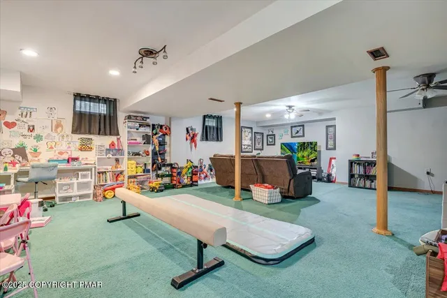 an aerial view of houses covered in trees