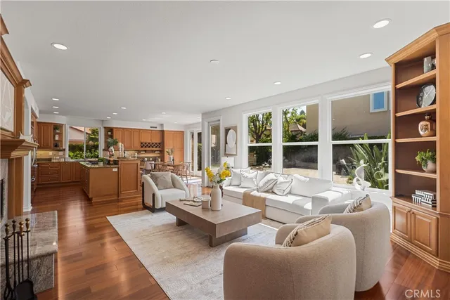 a kitchen with lots of counter top space and wooden floor