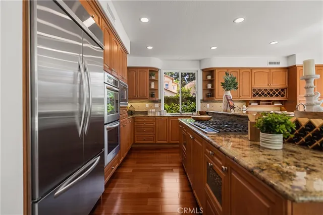 a view of a livingroom with furniture and wooden floor
