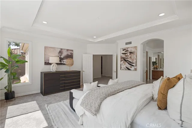 an aerial view of residential house with outdoor space and trees all around