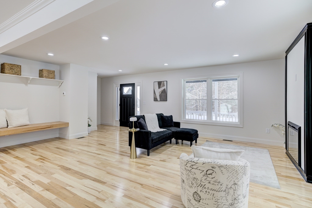 6 Winslow Road Ware, MA 01082 - Photo 11 of 34 a living room with furniture window and a wooden floor