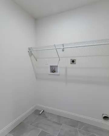 a view of a room with racks on the wall
