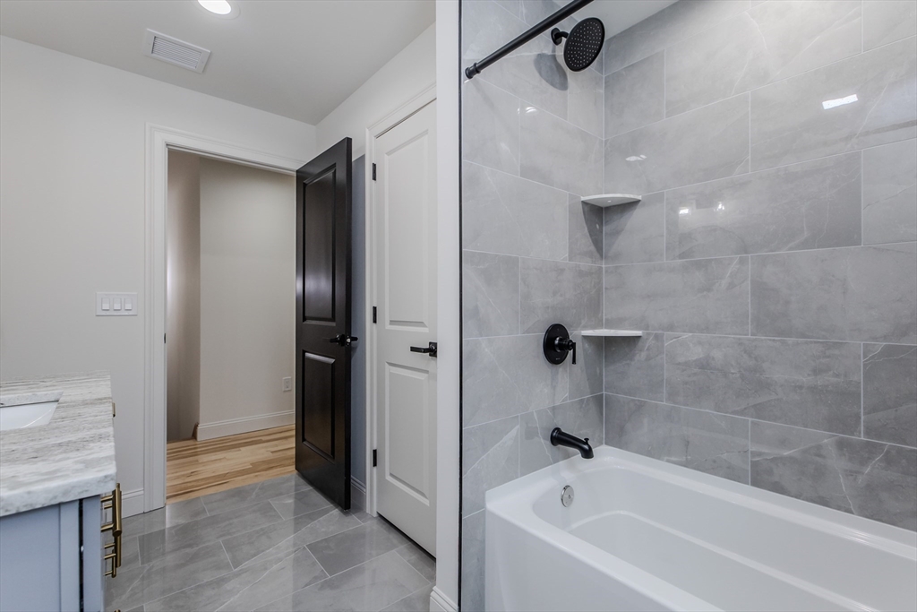 6 Winslow Road Ware, MA 01082 - Photo 28 of 35 a bathroom with a bathtub and a shower